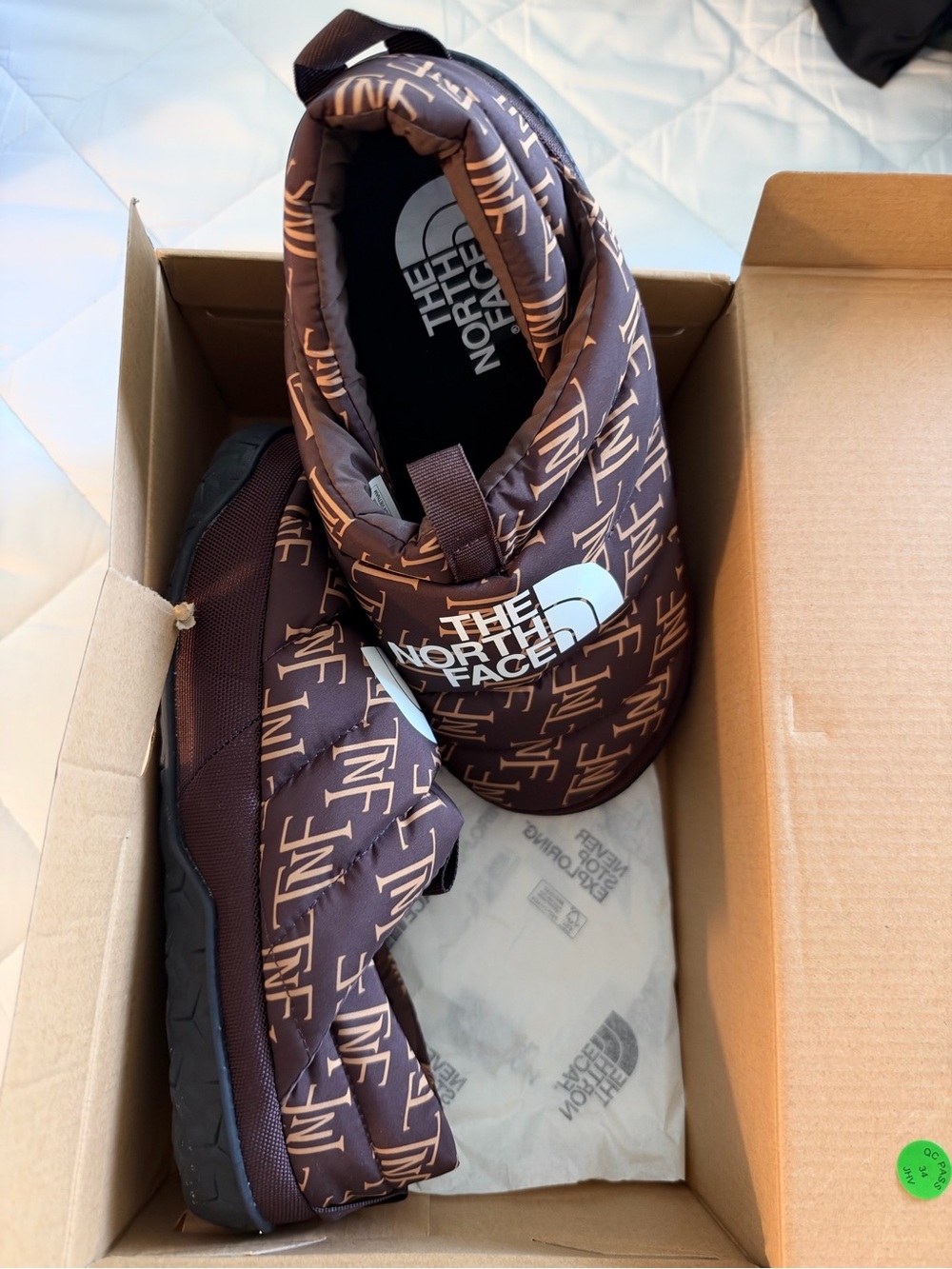 The North Face Quilted Slip-On Loafers in Dark Brown with Cream Logo women